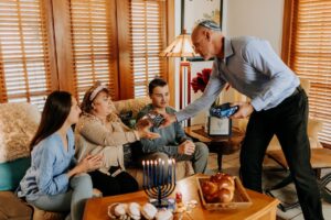 Hebrew family celebrating Channukah