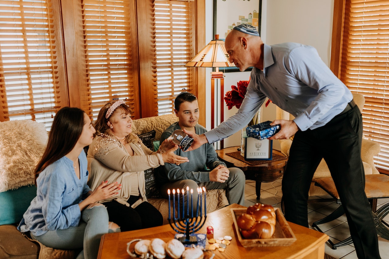 Hebrew family celebrating Channukah